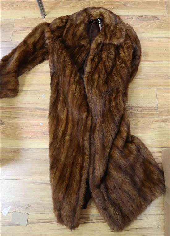 A Bourne & Hollingsworth full-length dark mink coat, another fur coat and a fur stole (3)